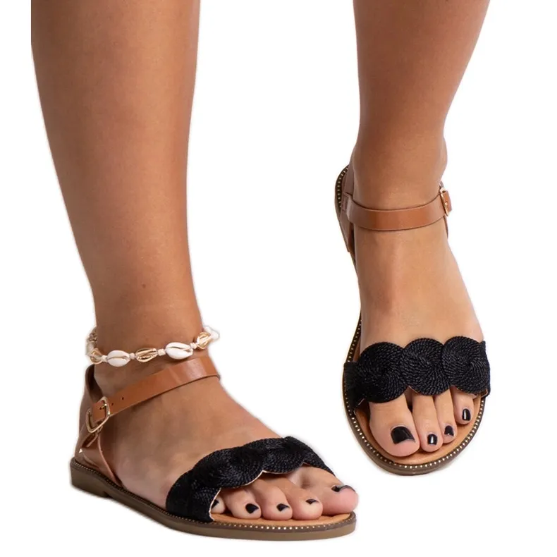 Black and brown sandals with gold accessories Amja